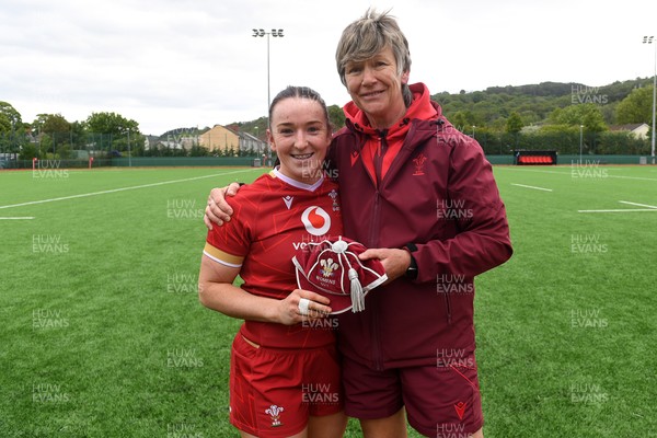 100526 - Wales U21 Women v Ireland U21 Women - Six Nations Women's U21 Series - Sian Jones of Wales Women is presented a cap by Liza Burgess, Wales Women's Head Coach