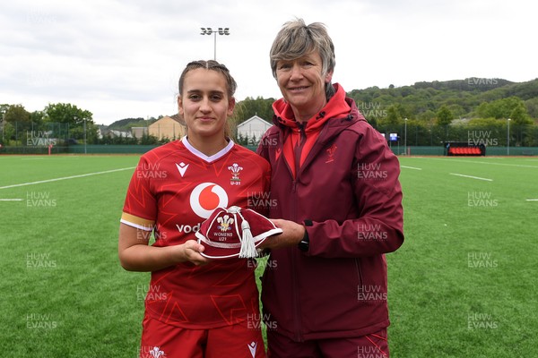 100526 - Wales U21 Women v Ireland U21 Women - Six Nations Women's U21 Series - Carys Hughes of Wales Women is presented a cap by Liza Burgess, Wales Women's Head Coach