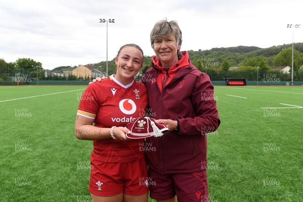 100526 - Wales U21 Women v Ireland U21 Women - Six Nations Women's U21 Series - Kendall Waudby of Wales Women is presented a cap by Liza Burgess, Wales Women's Head Coach