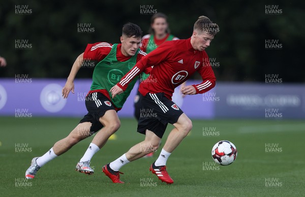 310820 - Wales U21s Football Training - Liam Cullen and Harry Clifton with the ball during training