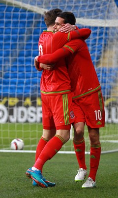 310315 -Wales U21s v Bulgaria U21s - UEFA U21 Championship Qualifier - Tom O'Sullivan of Wales celebrates scoring his first goal with Wes Burns