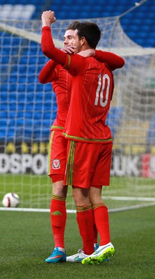310315 -Wales U21s v Bulgaria U21s - UEFA U21 Championship Qualifier - Tom O'Sullivan of Wales celebrates scoring his first goal with Wes Burns