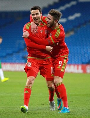 310315 -Wales U21s v Bulgaria U21s - UEFA U21 Championship Qualifier - Tom O'Sullivan of Wales celebrates scoring his second goal with Wes Burns