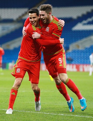 310315 -Wales U21s v Bulgaria U21s - UEFA U21 Championship Qualifier - Tom O'Sullivan of Wales celebrates scoring his second goal with Wes Burns