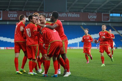 310315 -Wales U21s v Bulgaria U21s - UEFA U21 Championship Qualifier - Tom O'Sullivan of Wales celebrates scoring his second goal with team mates
