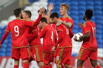 310315 -Wales U21s v Bulgaria U21s - UEFA U21 Championship Qualifier - Josh Yorweth of Wales celebrates scoring a goal with team mates