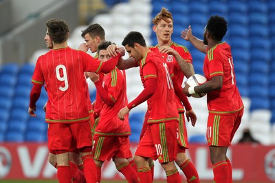 310315 -Wales U21s v Bulgaria U21s - UEFA U21 Championship Qualifier - Josh Yorweth of Wales celebrates scoring a goal with team mates