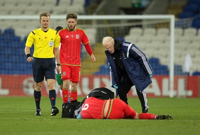 310315 -Wales U21s v Bulgaria U21s - UEFA U21 Championship Qualifier - Joseph Wright of Wales is down injured