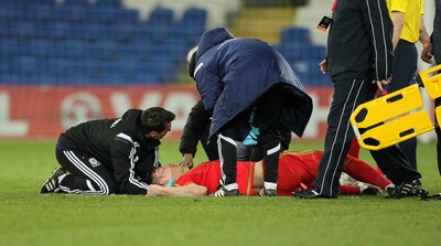 310315 -Wales U21s v Bulgaria U21s - UEFA U21 Championship Qualifier - Joseph Wright of Wales down injured