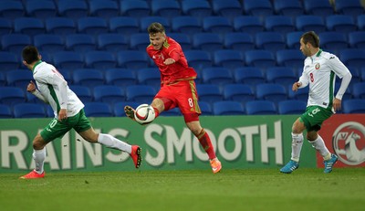310315 -Wales U21s v Bulgaria U21s - UEFA U21 Championship Qualifier - Lee Evans of Wales crosses the ball