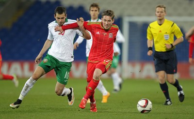 310315 -Wales U21s v Bulgaria U21s - UEFA U21 Championship Qualifier - Harry Wilson of Wales is brought down by Georg Iliev of Bulgaria