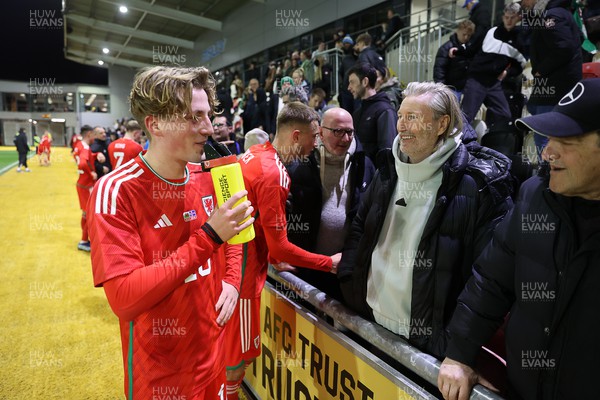 161123 - Wales U21s v Iceland U21s - UEFA U21s Qualifying Round - Charlie Savage of Wales with his father Robbie after the game