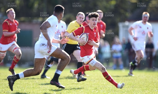 260317 - Wales Under 18 v England Under 18 - James McCarthy of Wales takes on Ben Loader