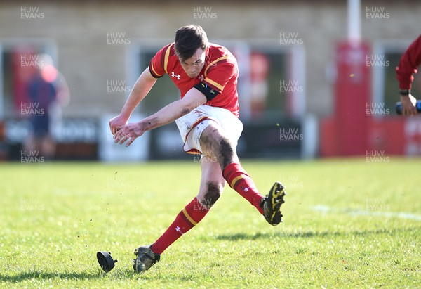 260317 - Wales Under 18 v England Under 18 - Cai Evans of Wales kicks at goal