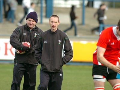 10.02.09 -Wales Under 20 training  Lee Jarvis (assistant coach) and Wayne Proctor  (fitness coach) watch the squad in action 