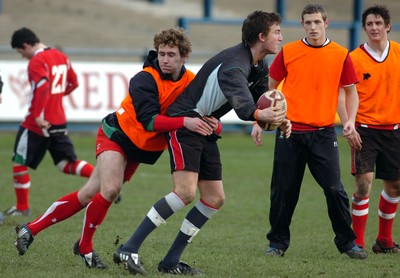 10.02.09 -Wales Under 20 training Matthew Jarvis in possession with James Loxton tackling 