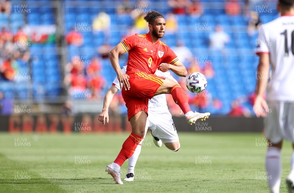 050621 - Wales v Albania - International Friendly - Tyler Roberts of Wales is challenged by Ardian Ismajli of Albania