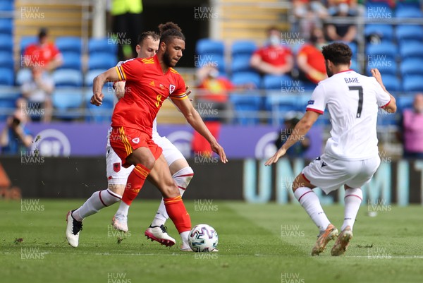 050621 - Wales v Albania - International Friendly - Tyler Roberts of Wales gets past both Ardian Ismajli and Keidi Bare of Albania