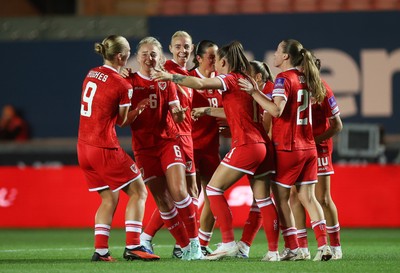 131026 - Wales Women v Albania Women - 2027 FIFA Womens World Cup qualifying play-off semi-final - Mayzee Davies of Wales celebrates scoring a goal with team mates