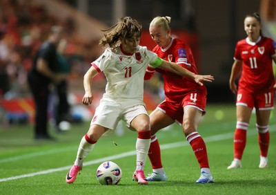 131026 - Wales Women v Albania Women - 2027 FIFA Womens World Cup qualifying play-off semi-final - Megi Doci of Albania is challenged by Sophie Ingle of Wales 