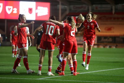 131026 - Wales Women v Albania Women - 2027 FIFA Womens World Cup qualifying play-off semi-final - Elise Hughes of Wales celebrates scoring a goal with team mates