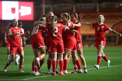 131026 - Wales Women v Albania Women - 2027 FIFA Womens World Cup qualifying play-off semi-final - Elise Hughes of Wales celebrates scoring a goal with team mates