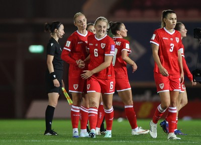 131026 - Wales Women v Albania Women - 2027 FIFA Womens World Cup qualifying play-off semi-final - Sophie Ingle and Mayzee Davies of Wales at full time