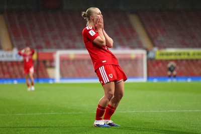 140426 - Wales v Albania - 2027 FIFA Women's World Cup Qualifying - Elise Hughes of Wales reacts after a missed chance