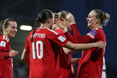 140426 - Wales v Albania - 2027 FIFA Women's World Cup Qualifying - Rhiannon Roberts of Wales celebrates scoring her team’s third goal with teammates