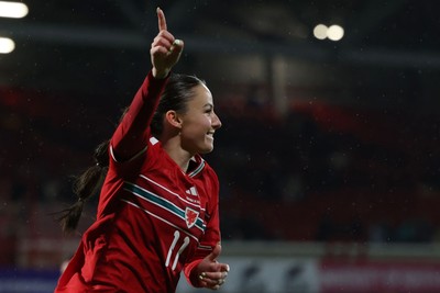 140426 - Wales v Albania - 2027 FIFA Women's World Cup Qualifying - Hannah Cain of Wales celebrates scoring her team’s fourth goal