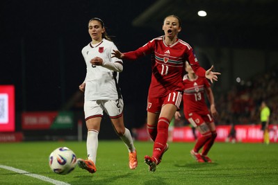140426 - Wales v Albania - 2027 FIFA Women's World Cup Qualifying - Hannah Cain of Wales reacts as the ball goes out of play