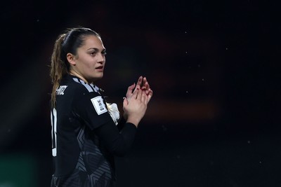 140426 - Wales v Albania - 2027 FIFA Women's World Cup Qualifying - Safia Middleton-patel of Wales applauds the fans following victory