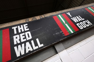 140426 - Wales v Albania - 2027 FIFA Women's World Cup Qualifying - A detailed view of ‘The red wall’ writing inside the stadium prior to the game