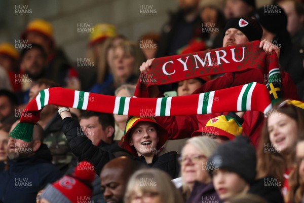 140426 - Wales v Albania - 2027 FIFA Women's World Cup Qualifying - Fans of Wales sing the national anthem