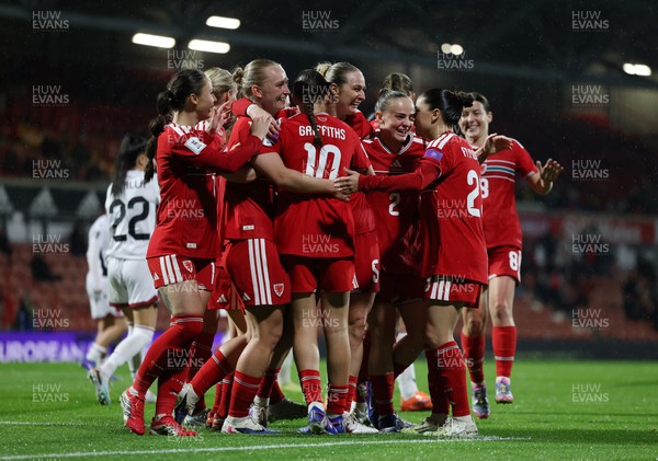140426 - Wales v Albania - 2027 FIFA Women's World Cup Qualifying - Rhiannon Roberts of Wales celebrates scoring her team’s third goal with teammates
