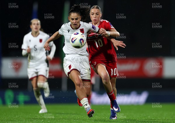 140426 - Wales v Albania - 2027 FIFA Women's World Cup Qualifying - Arbenita Curraj of Albania is challenged by Mared Griffiths of Wales