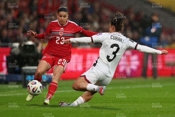 140426 - Wales v Albania - 2027 FIFA Women's World Cup Qualifying - Ffion Morgan of Wales is challenged by Arbenita Curraj of Albania