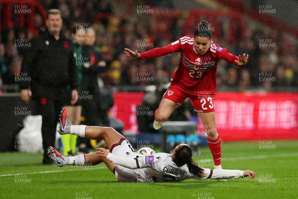 140426 - Wales v Albania - 2027 FIFA Women's World Cup Qualifying - Arbenita Curraj of Albania clashes with Ffion Morgan of Wales