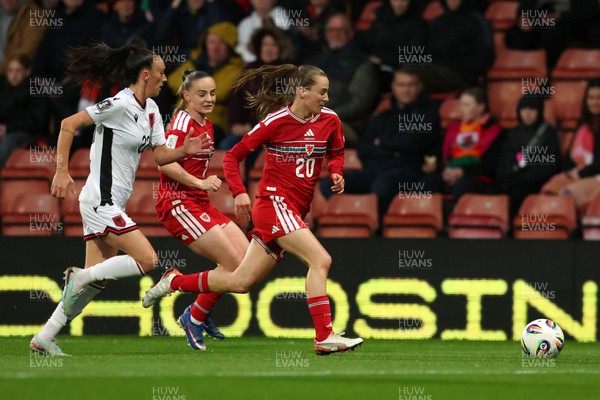 140426 - Wales v Albania - 2027 FIFA Women's World Cup Qualifying - Carrie Jones of Wales runs with the ball