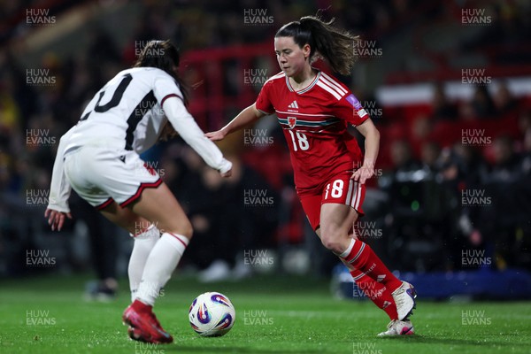 140426 - Wales v Albania - 2027 FIFA Women's World Cup Qualifying - Esther Morgan of Wales controls the ball whilst under pressure from Klea Hamonikaj of Albania