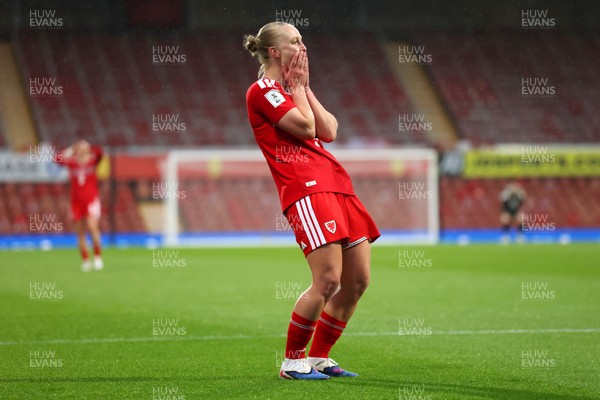 140426 - Wales v Albania - 2027 FIFA Women's World Cup Qualifying - Elise Hughes of Wales reacts after a missed chance