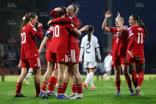 140426 - Wales v Albania - 2027 FIFA Women's World Cup Qualifying - Rhiannon Roberts of Wales celebrates scoring her team’s third goal with teammate Mared Griffiths