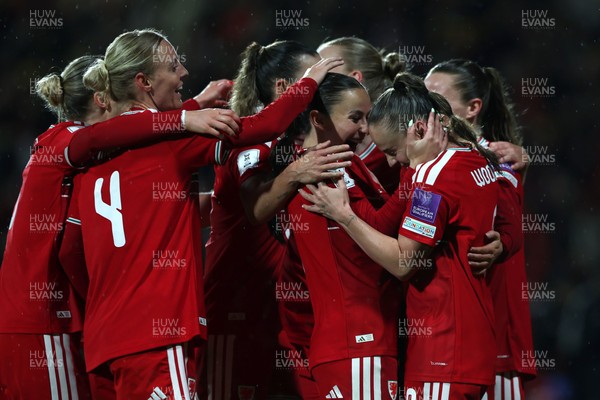 140426 - Wales v Albania - 2027 FIFA Women's World Cup Qualifying - Hannah Cain of Wales celebrates scoring her team’s fourth goal with teammate Lily Woodham