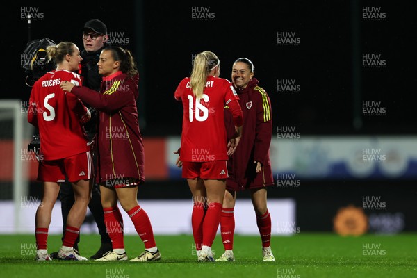 140426 - Wales v Albania - 2027 FIFA Women's World Cup Qualifying - Ffion Morgan of Wales and teammates celebrate victory at full time