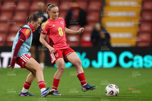 140426 - Wales v Albania - 2027 FIFA Women's World Cup Qualifying - Hannah Cain and Lily Woodham of Wales warm up prior to the game