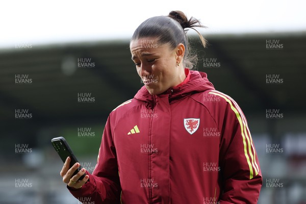 140426 - Wales v Albania - 2027 FIFA Women's World Cup Qualifying - Ffion Morgan of Wales inspects the pitch prior to the game
