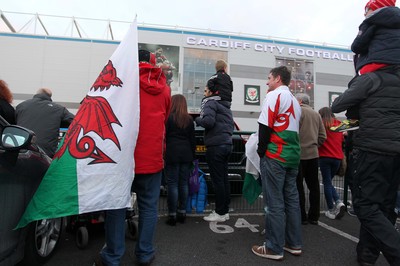 131015 - Wales v Andorra - UEFA European Championship Qualifiers - Fans watch the team arrive