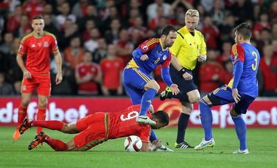 131015 - Wales v Andorra - UEFA European Championship Qualifiers - Hal Robson-Kanu of Wales slides in to tackle Marcio Vieira of Andorra