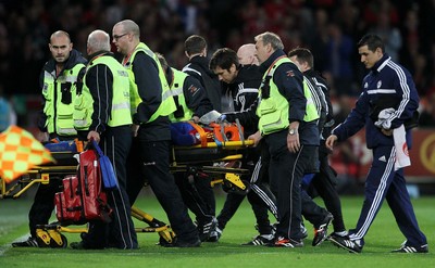 131015 - Wales v Andorra - UEFA European Championship Qualifiers - Victor Moreira of Andorra is taken off the field