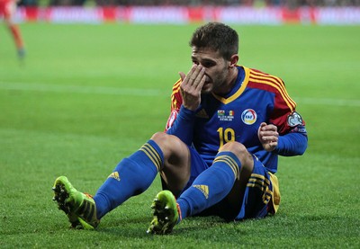131015 - Wales v Andorra - UEFA European Championship Qualifiers - Ivan Lorenzo of Andorra goes down holding his nose